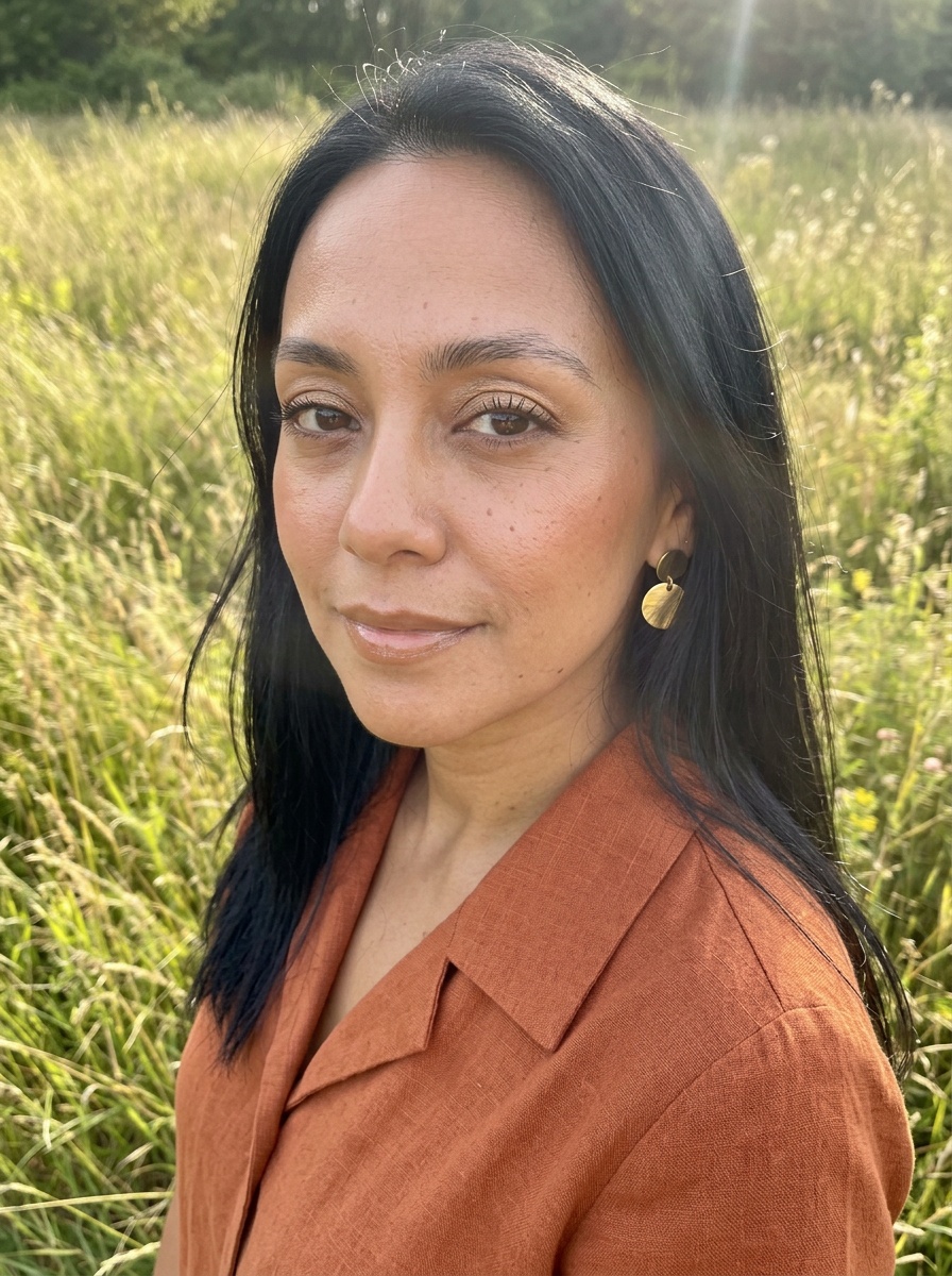 70s Makeup on a woman in her early 30s with tan skin and downturned brown eyes