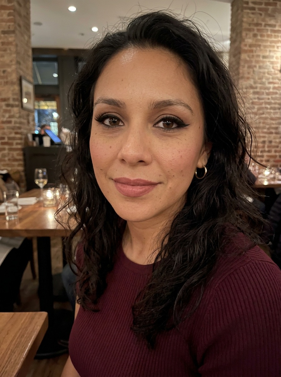Cat Eye Makeup on a woman in her early 30s with tan skin and brown eyes