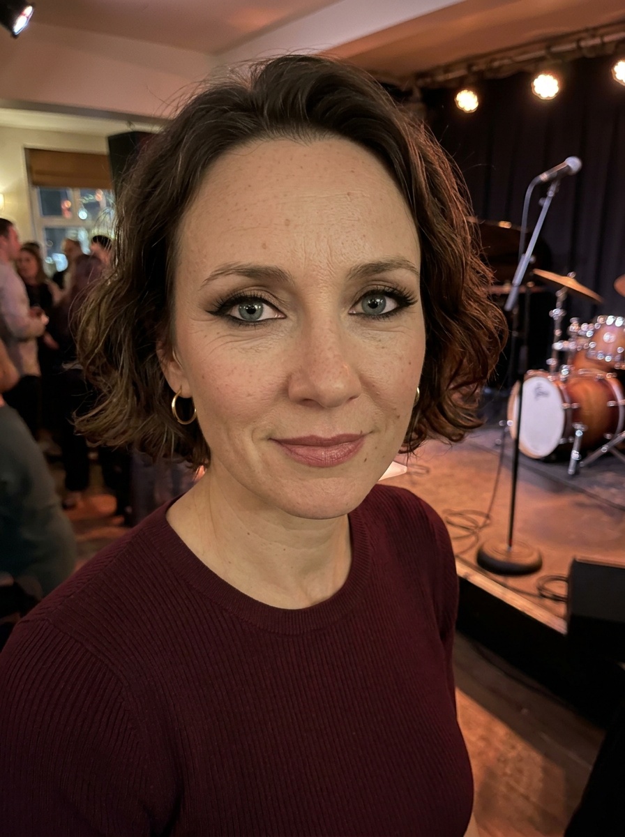 Cat Eye Makeup on a woman in her mid 40s with light skin and deep-set blue-grey eyes
