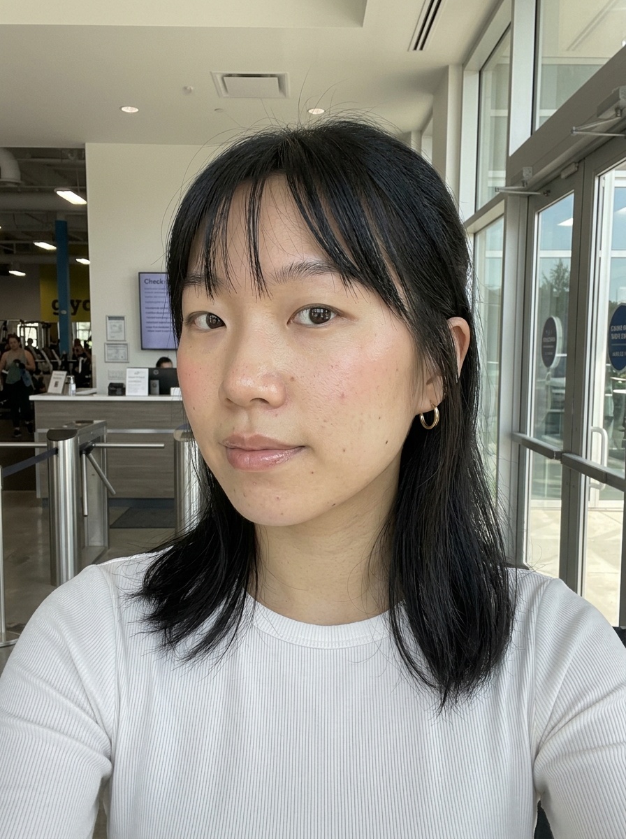 Clean Girl Makeup on a woman in her mid 20s with light skin and monolid eyes