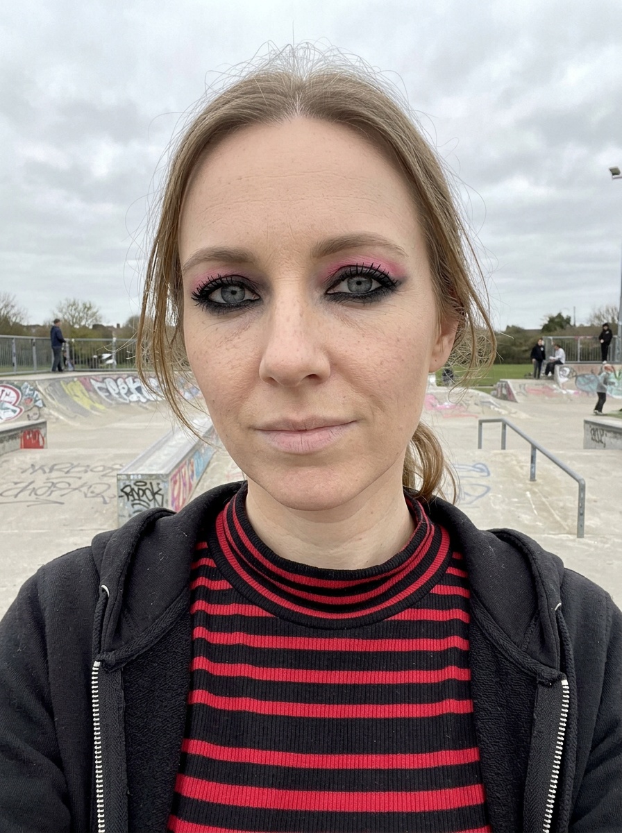 Emo Makeup on a woman in her early 30s with fair skin and hooded blue eyes