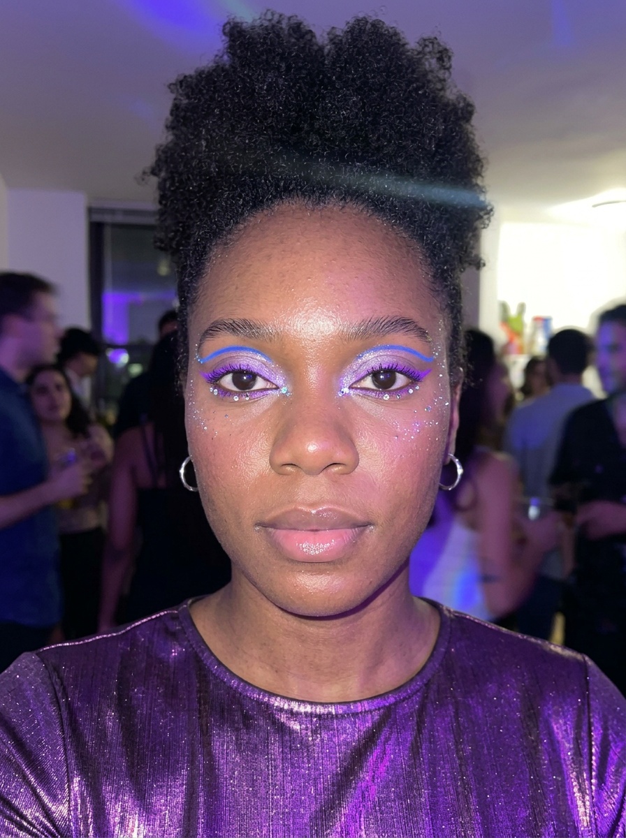 Euphoria Makeup on a woman in her mid 20s with deep skin and brown eyes