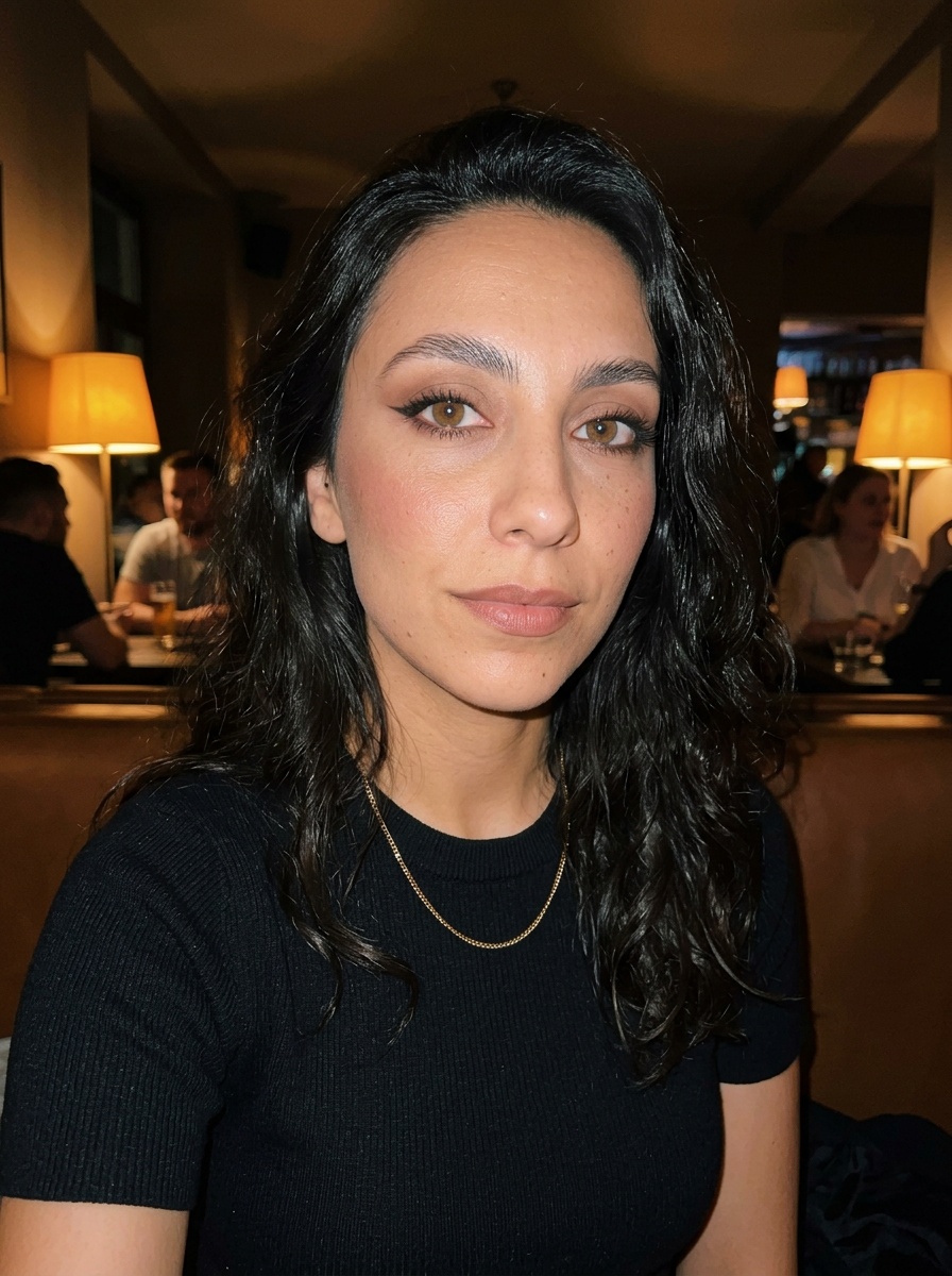 Siren Eyes on a woman in her late 20s with olive skin and almond-shaped hazel eyes